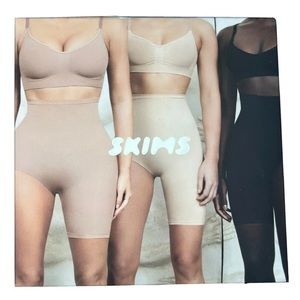 Skims One Leg High Rise Short- Right Leg Exposed- L/XL black